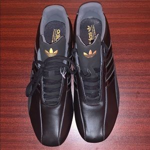 Black adidas design in collaboration with Porsche